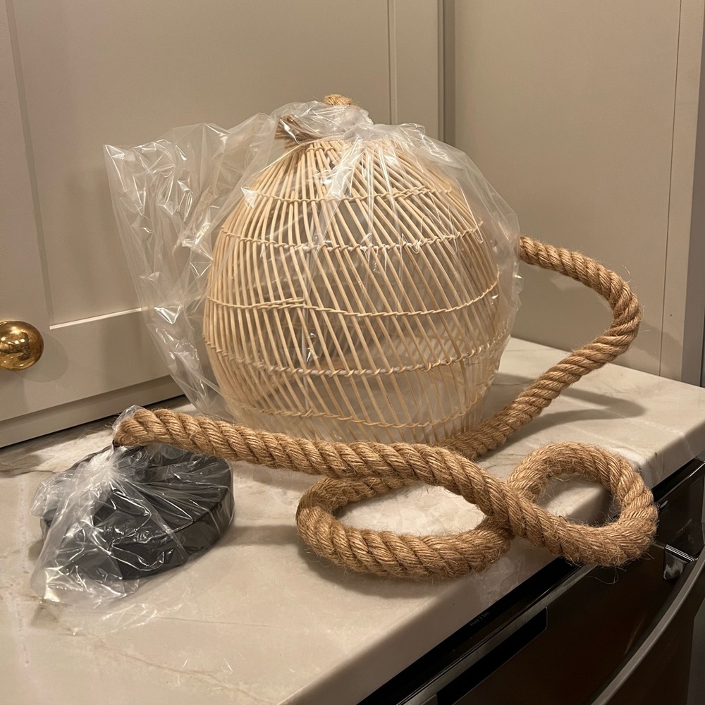 Rattan light with natural rope pendant